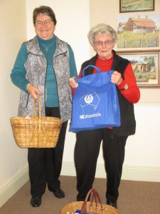 Eileen and Jeanne getting ready to deliver food to Care and Share.